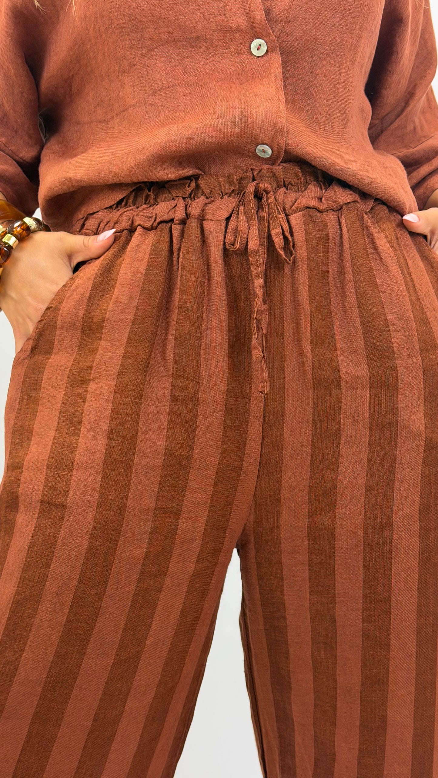 Calça linho risca tons telha