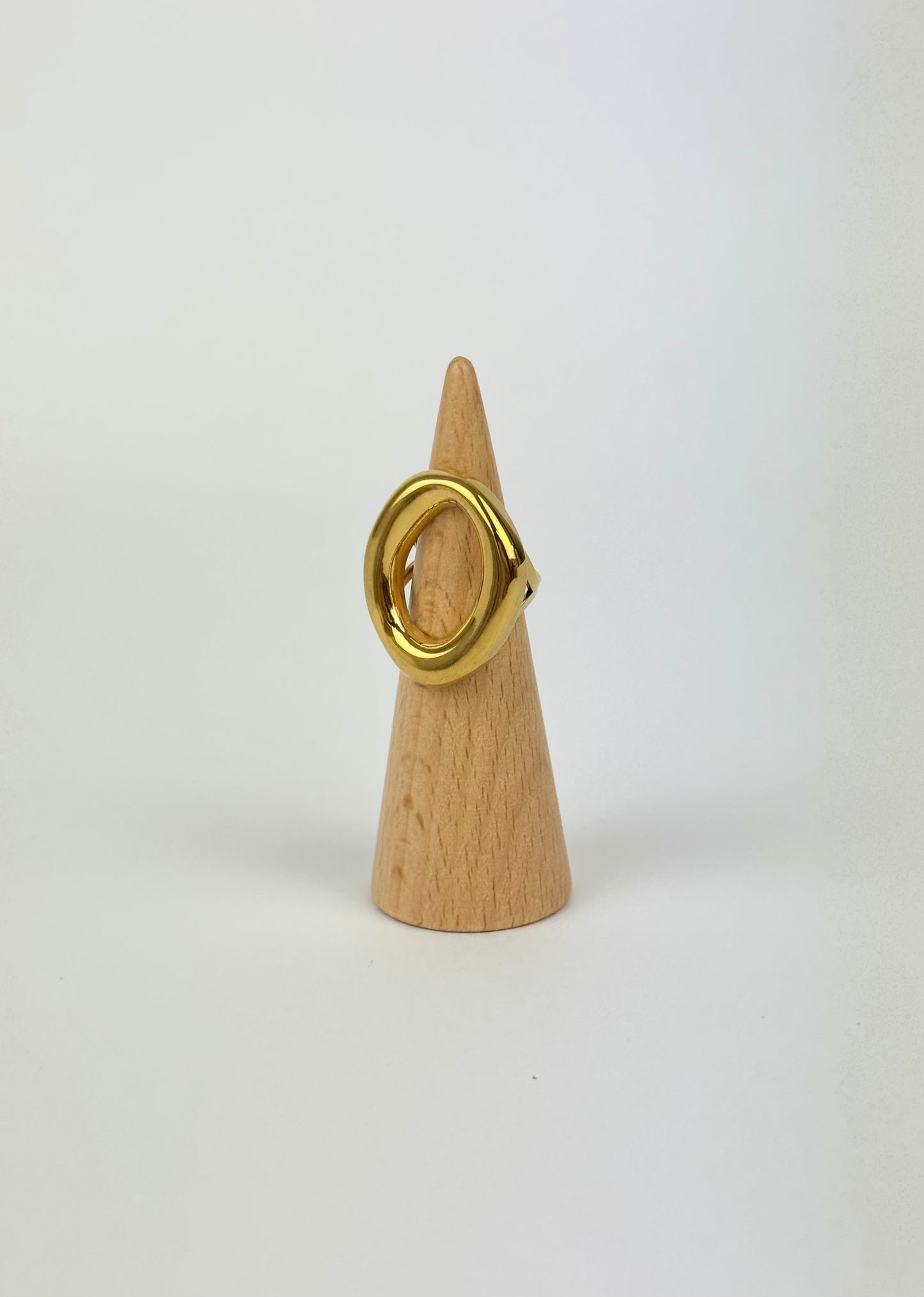 Anel aço dourado círculo assimétrico