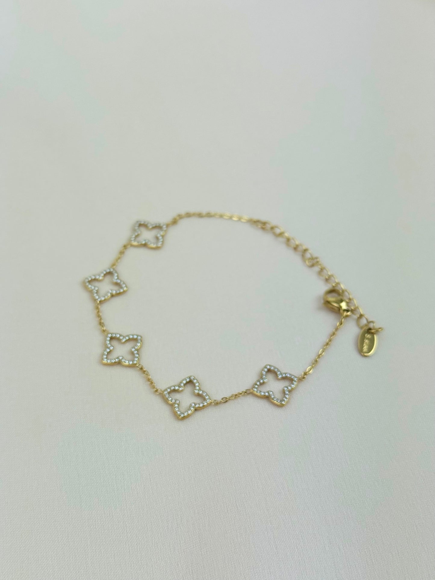 Pulseira flores quatro pétalas brilhantes