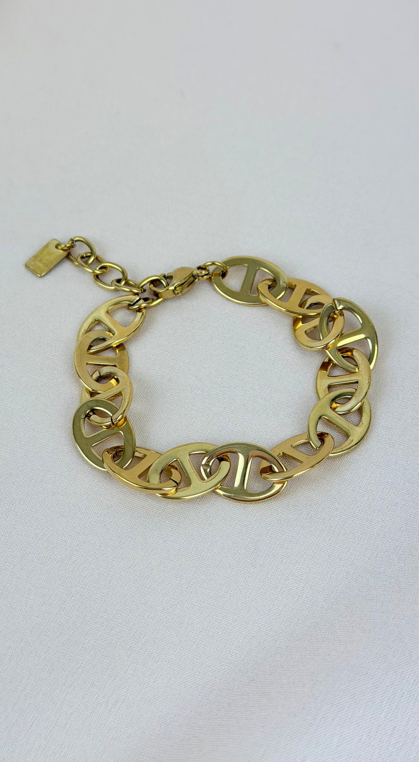 Pulseira aço dourado motivos geométricos