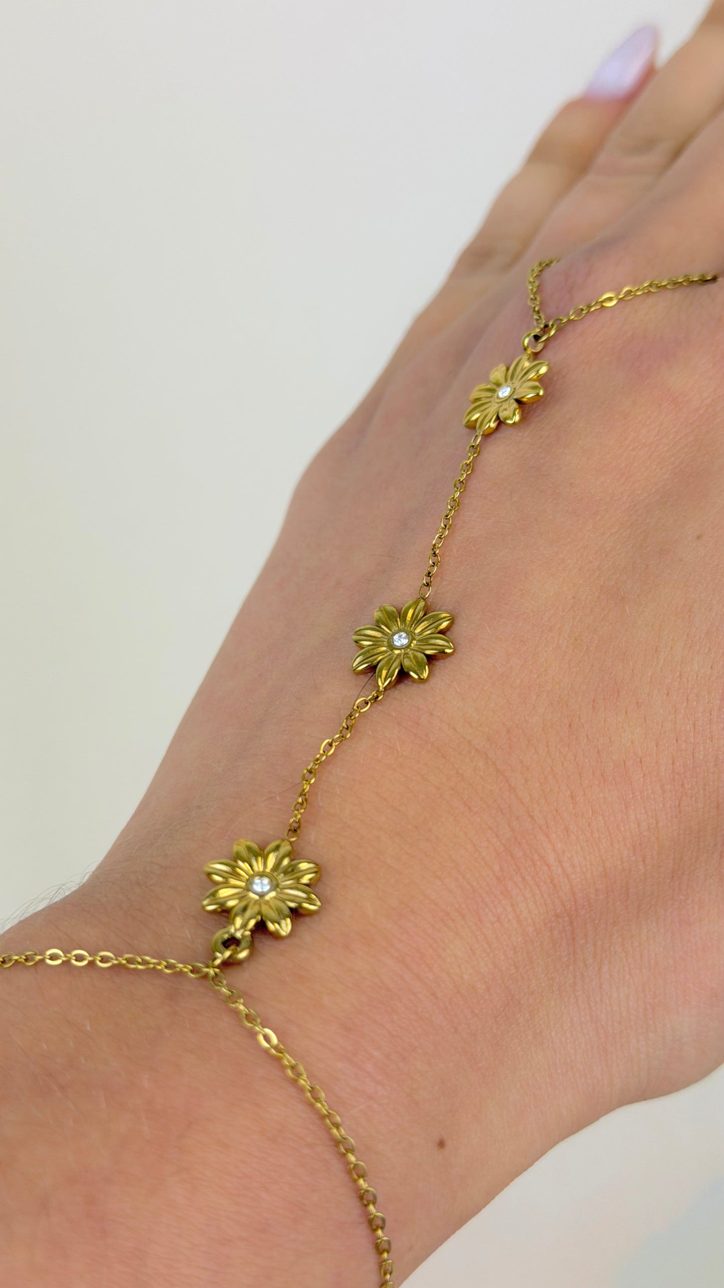 Anel/pulseira aço dourado com florzinhas