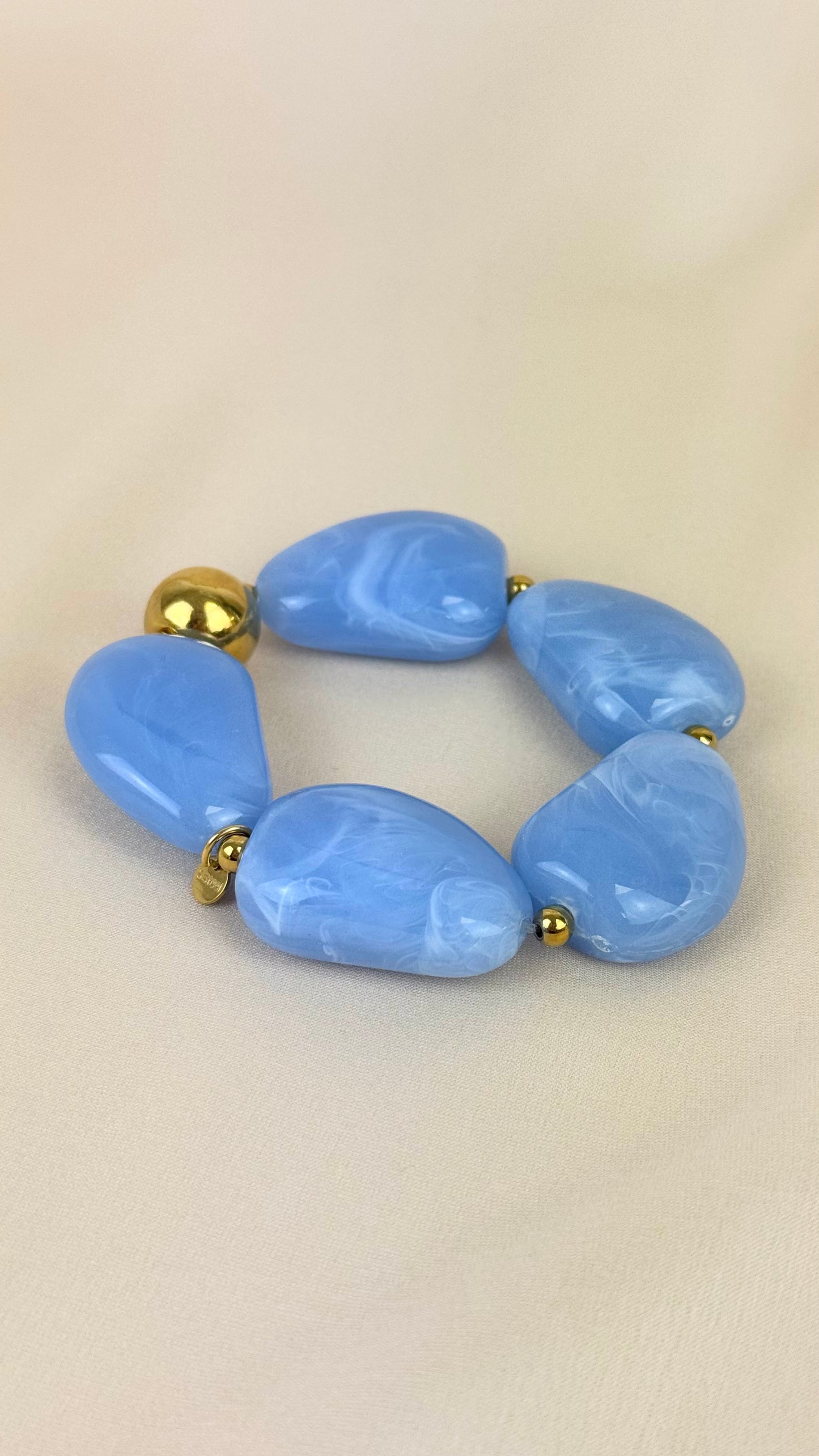 Pulseira elástica peças em acrílico azul-celeste