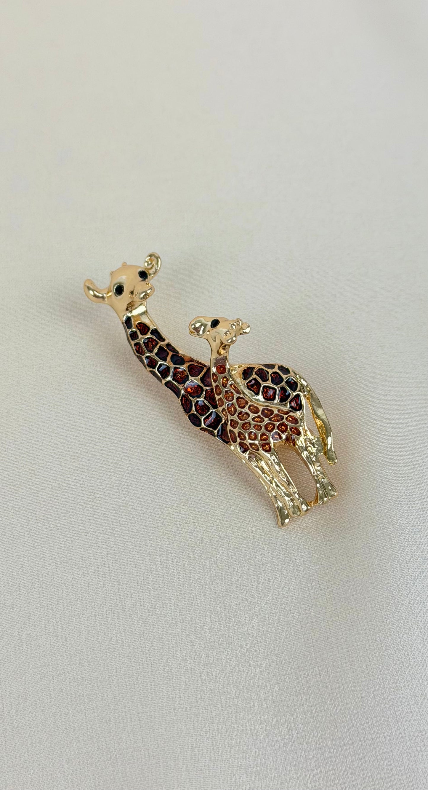 Alfinete girafas