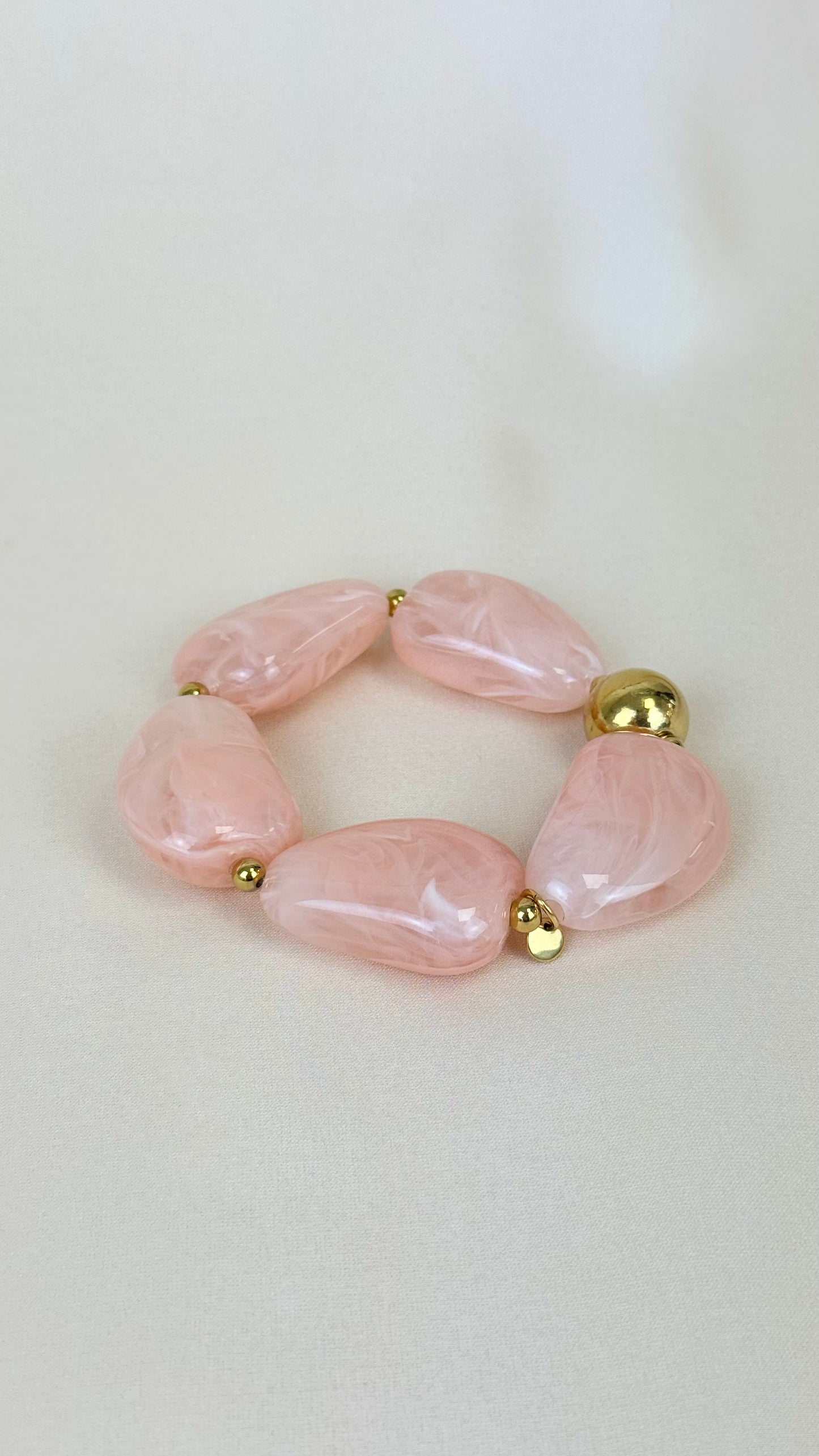 Pulseira elástica peças em acrílico rosa