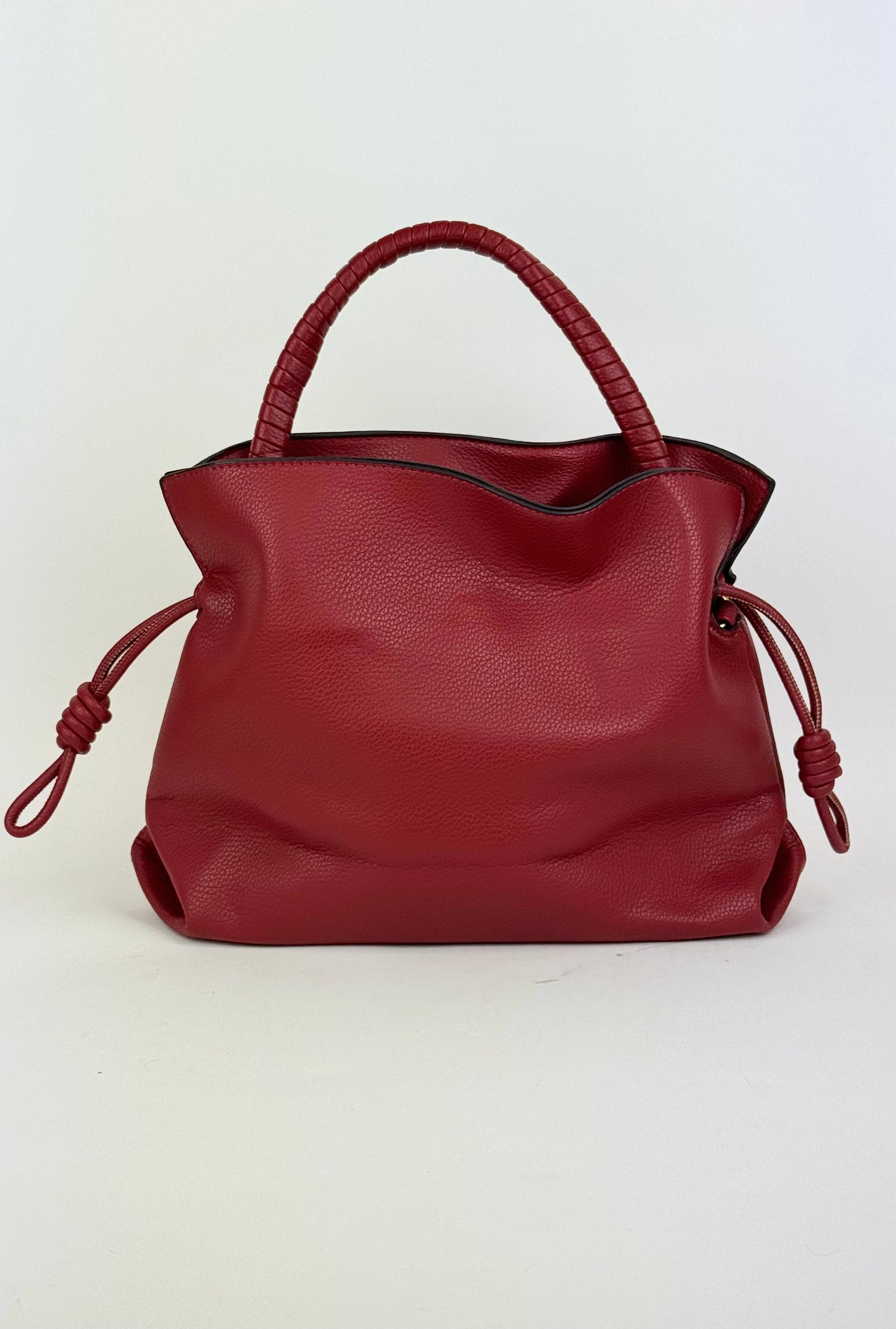 Carteira vermelha com alça entrelaçada