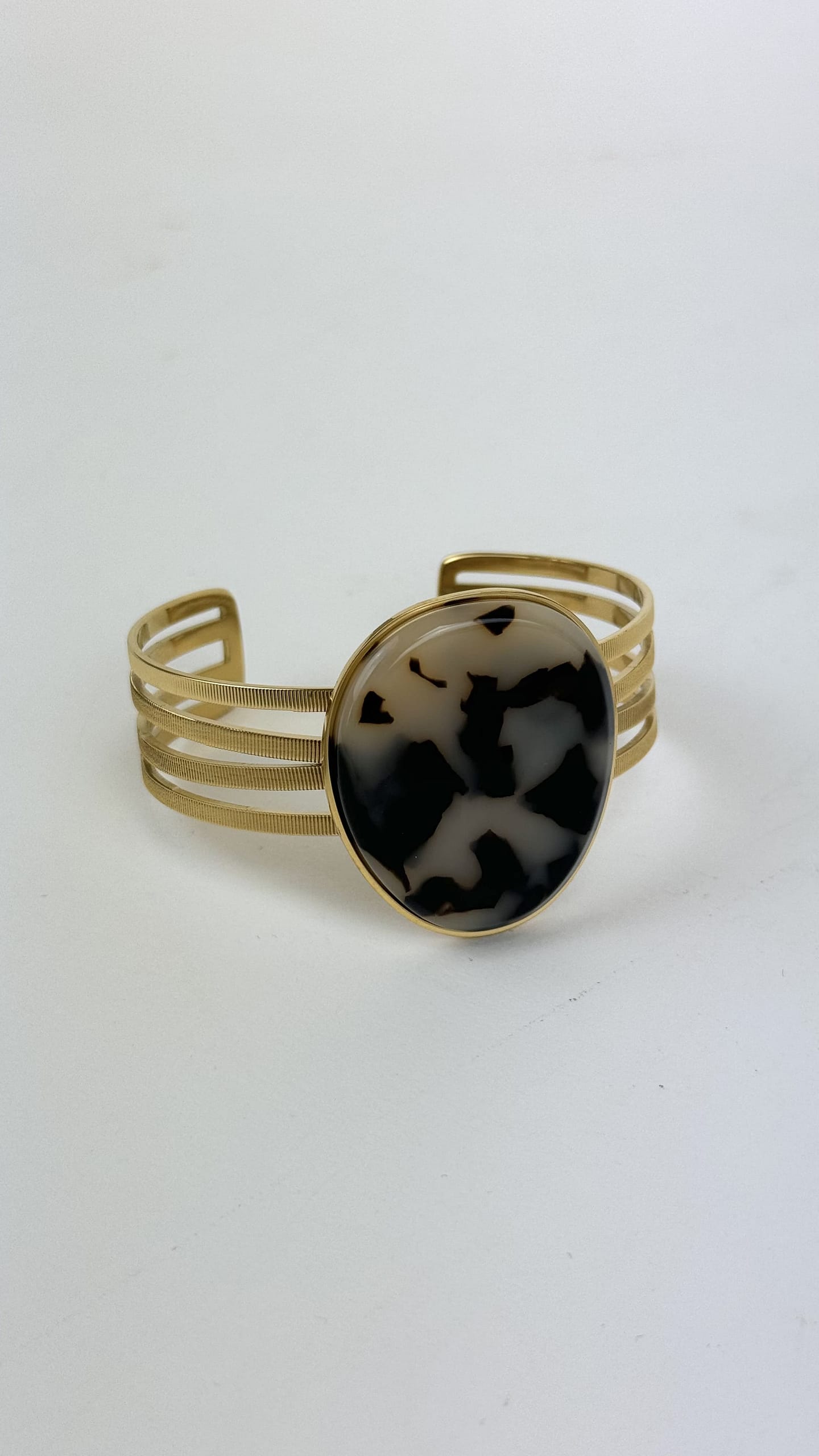 Escrava dourada com pedra animal-print