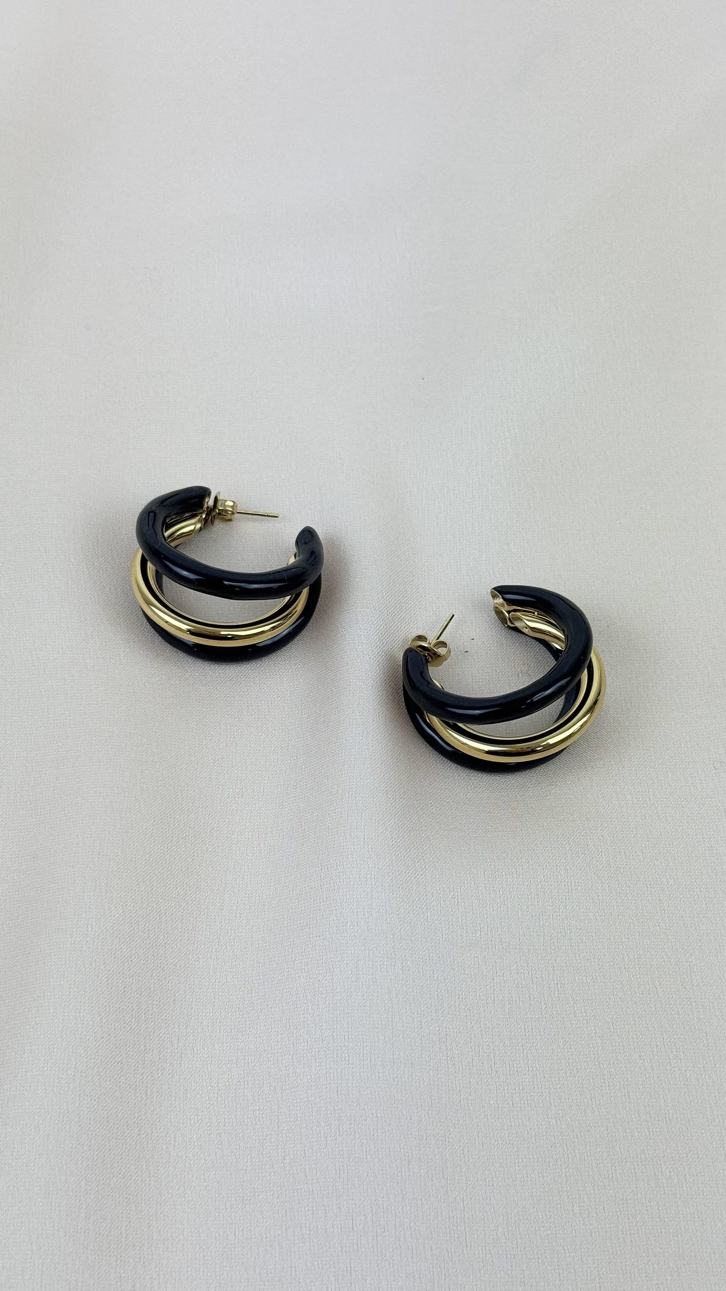 Brincos argola aço dourado e preto