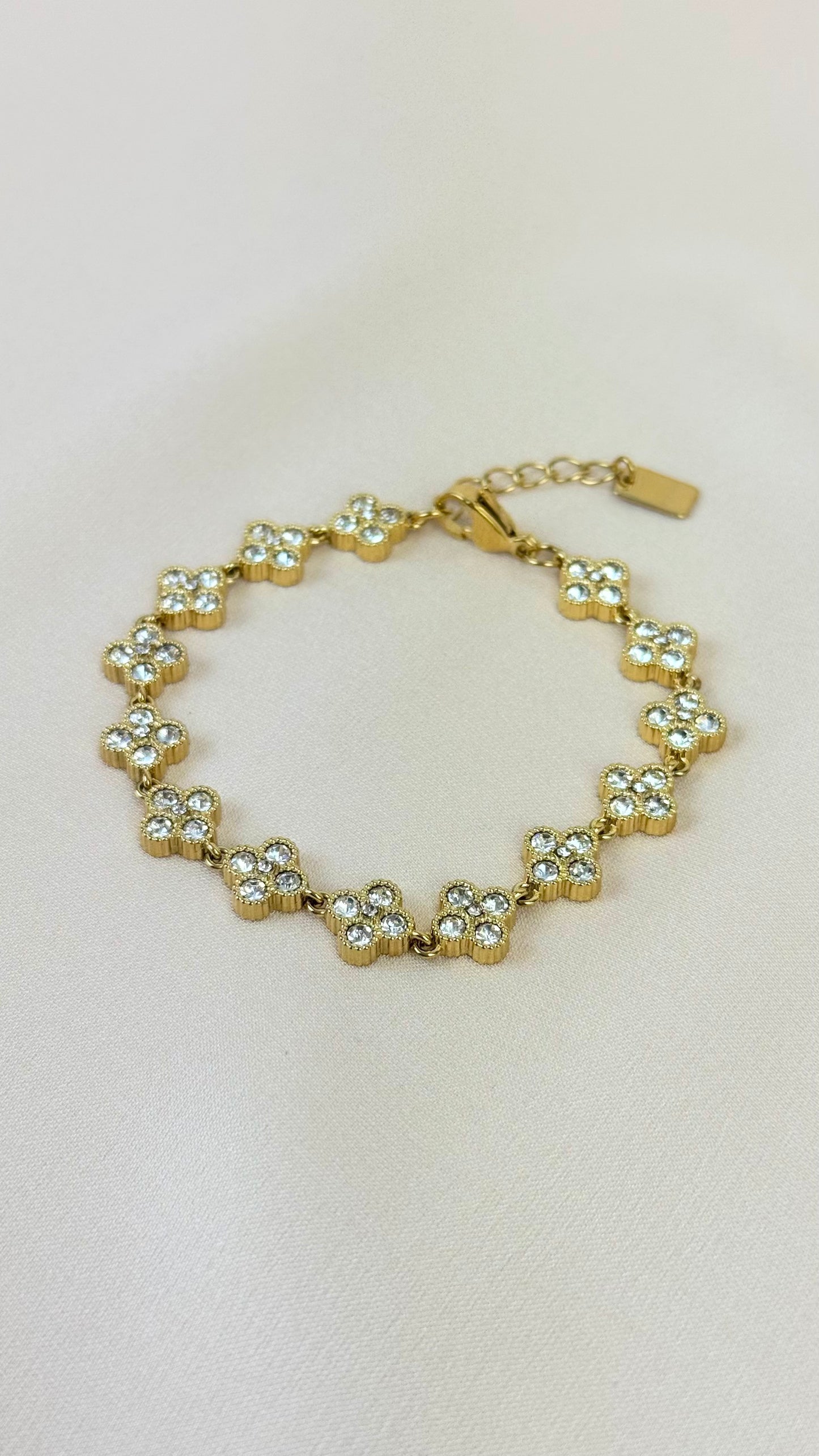 Pulseira dourada flores brilhantes