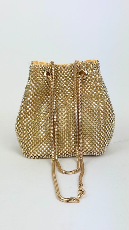 Mala bucket com bolinhas douradas
