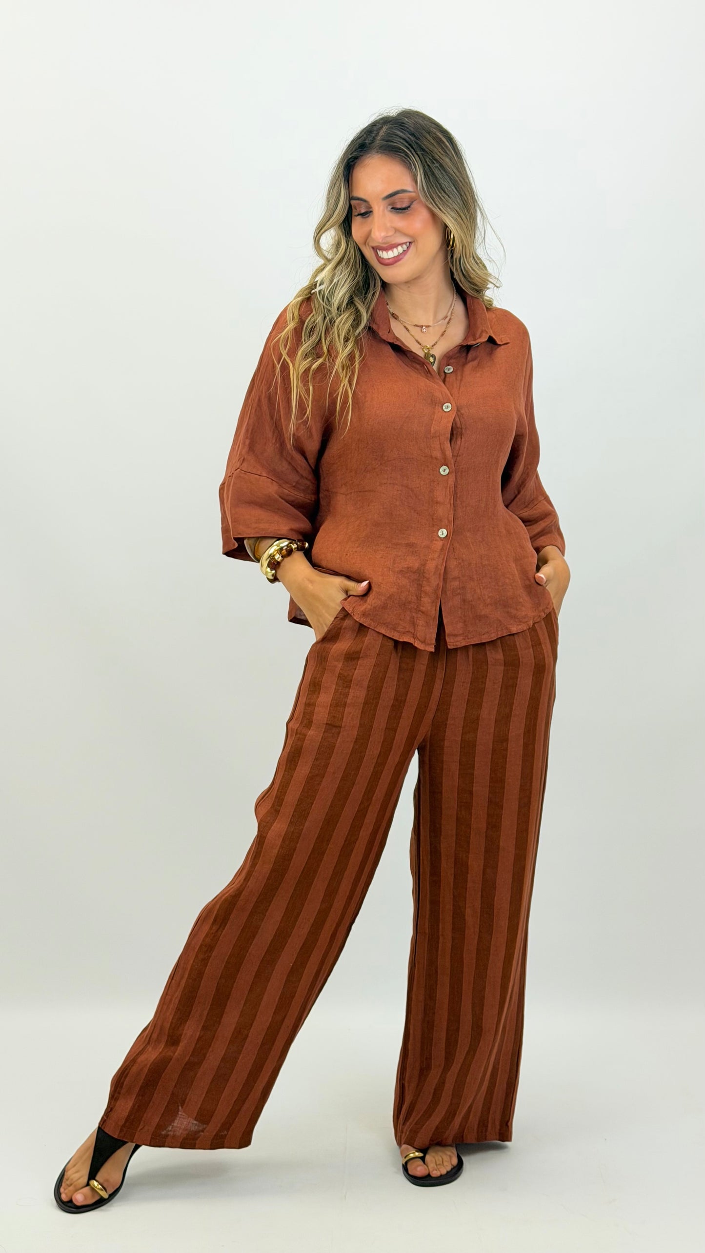 Calça linho risca tons telha
