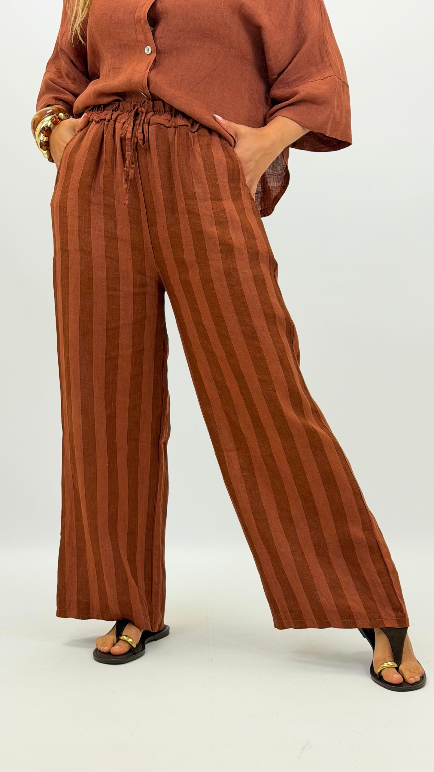 Calça linho risca tons telha