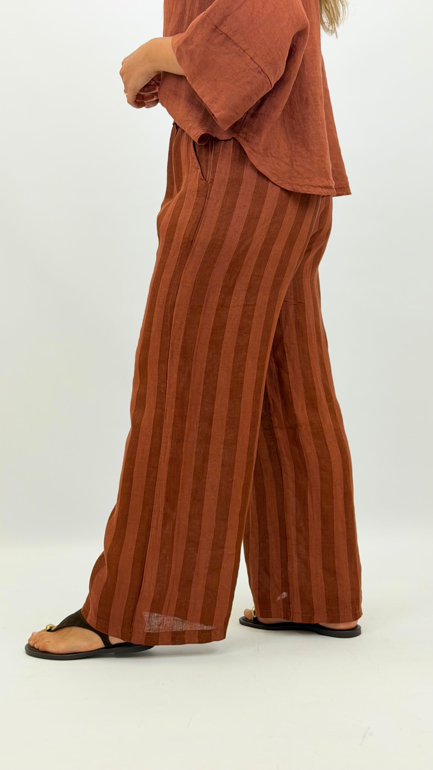 Calça linho risca tons telha