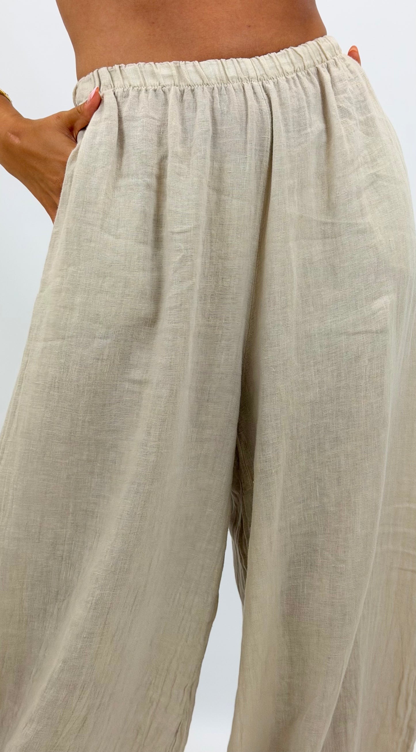 Calça linho bege com elastico no tornozelo