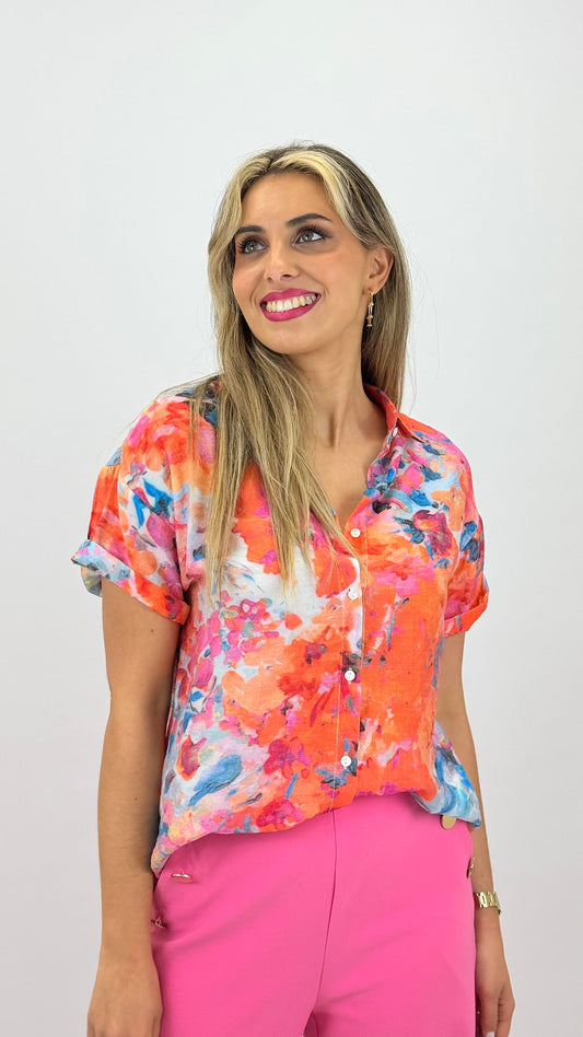 Blusa estampado abstrato tons laranja e azul