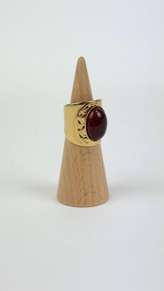 Anel aço dourado com pedra estilo âmbar