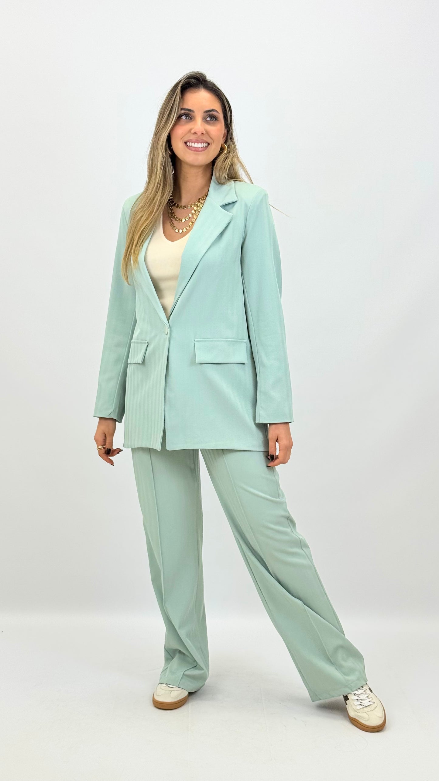 Fato tecido verde-água