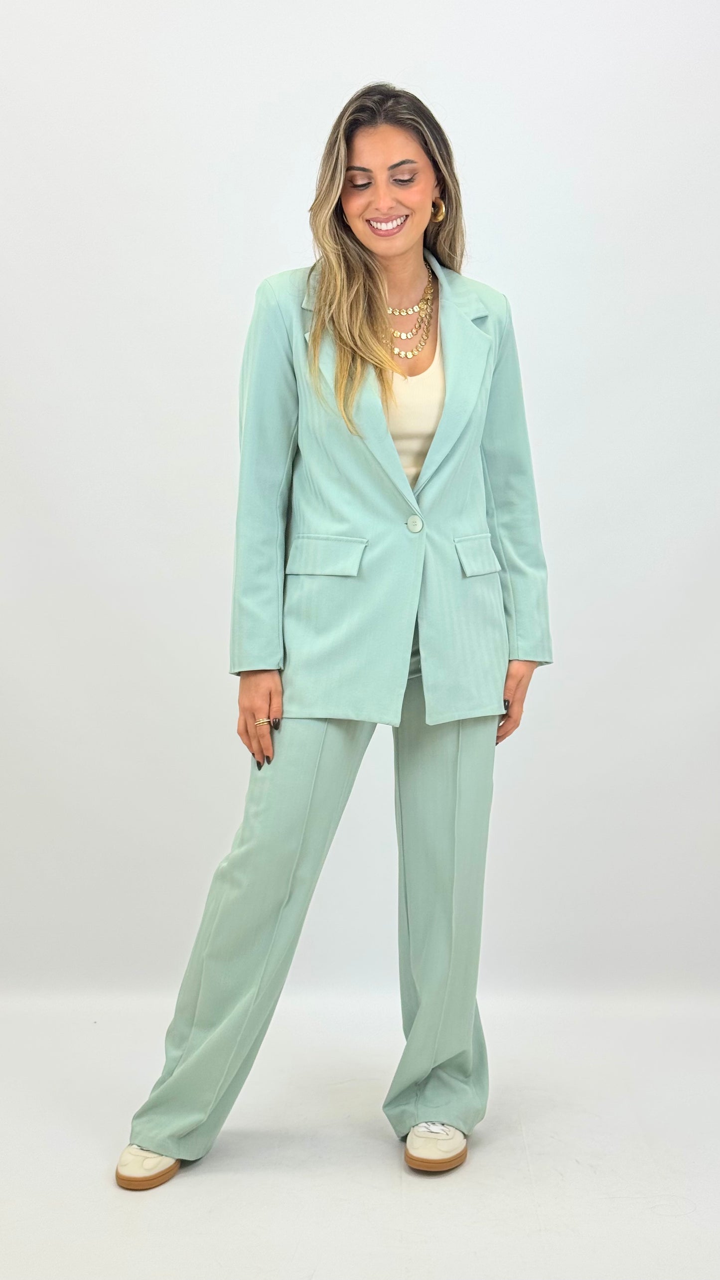 Fato tecido verde-água