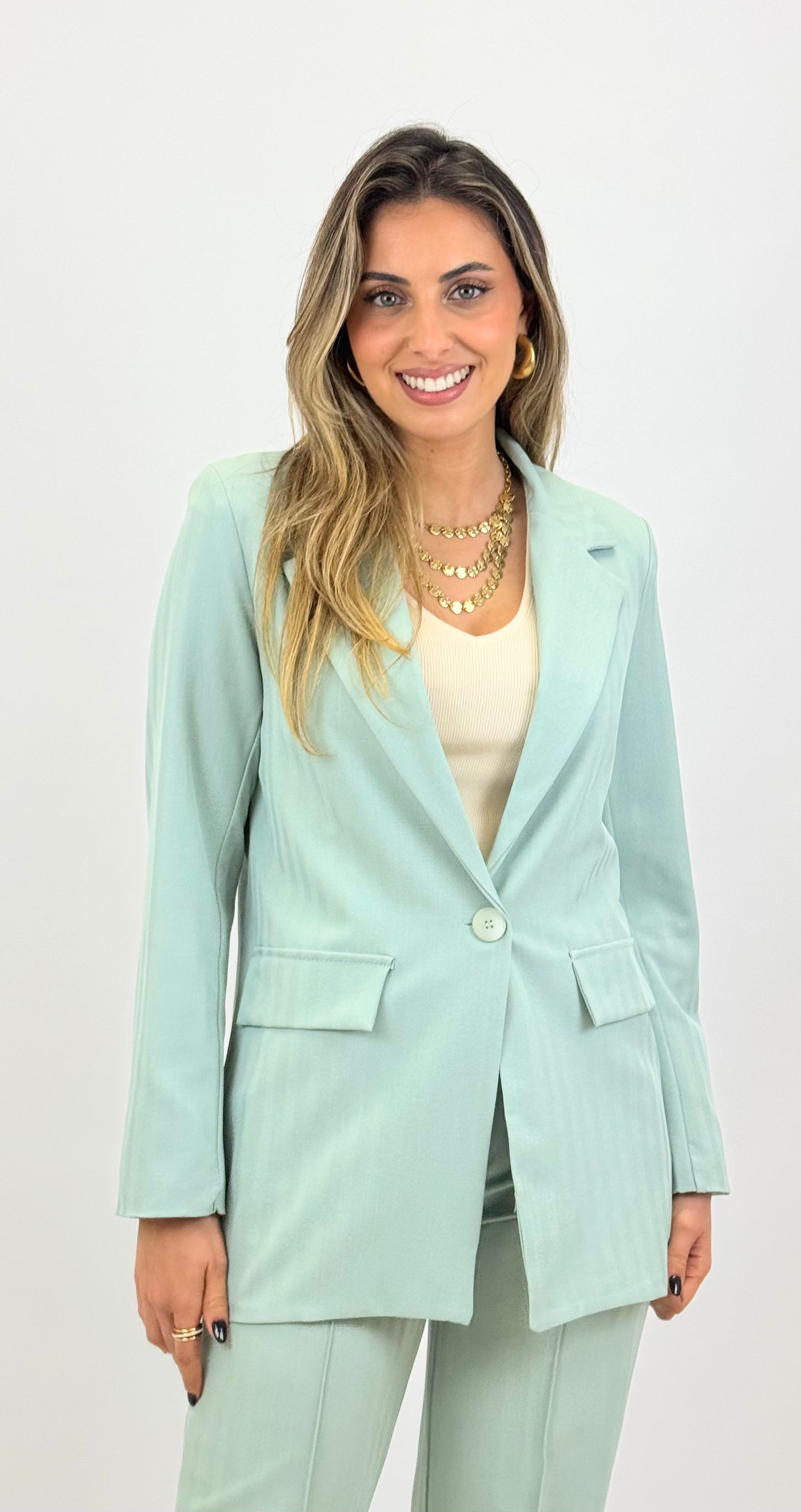 Fato tecido verde-água