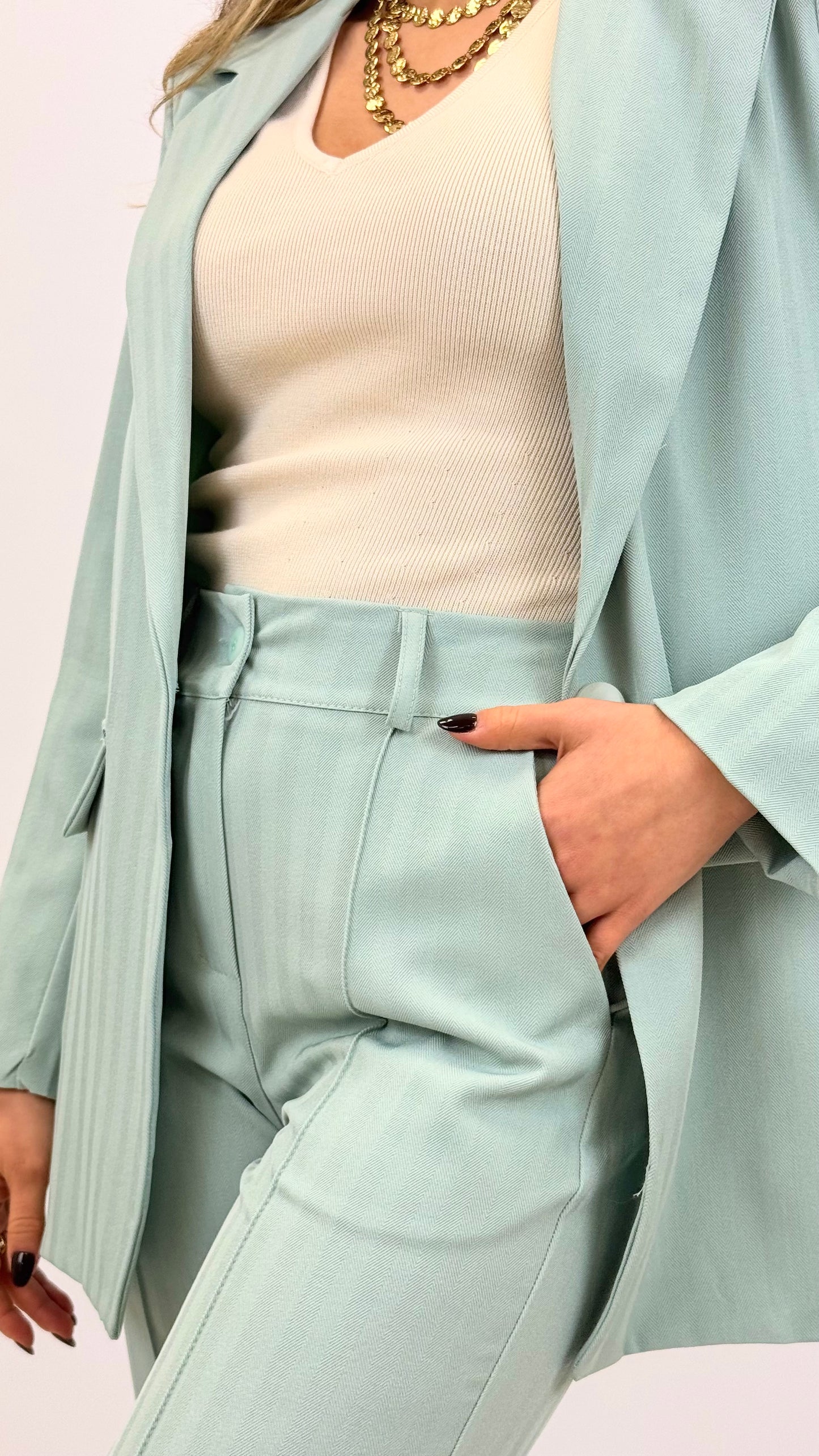 Fato tecido verde-água