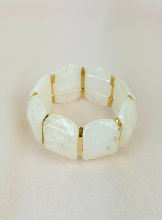 Pulseira elástica em acrílico pérola