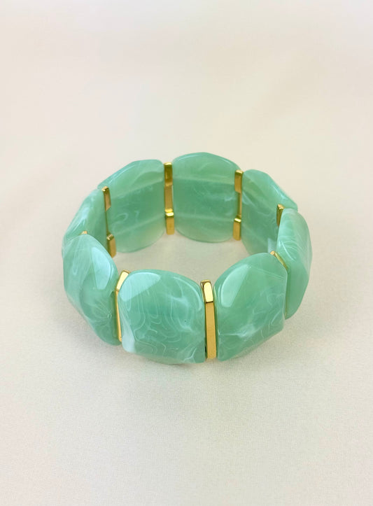 Pulseira elástica em acrílico verde-água