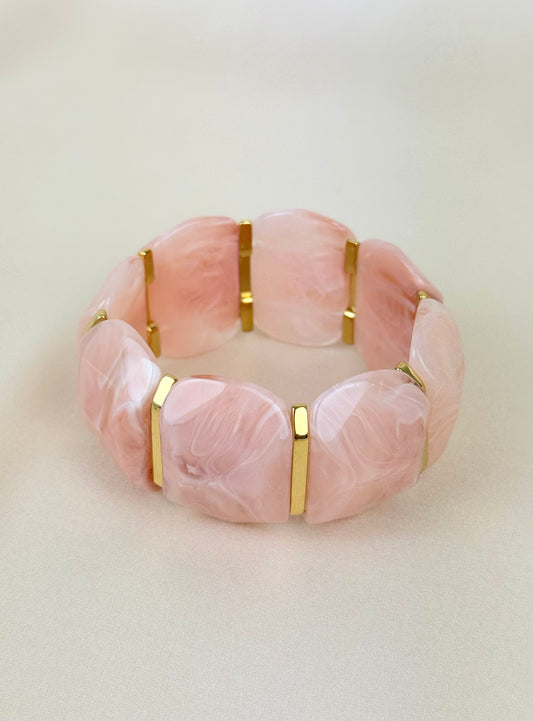 Pulseira elástica em acrílico rosa