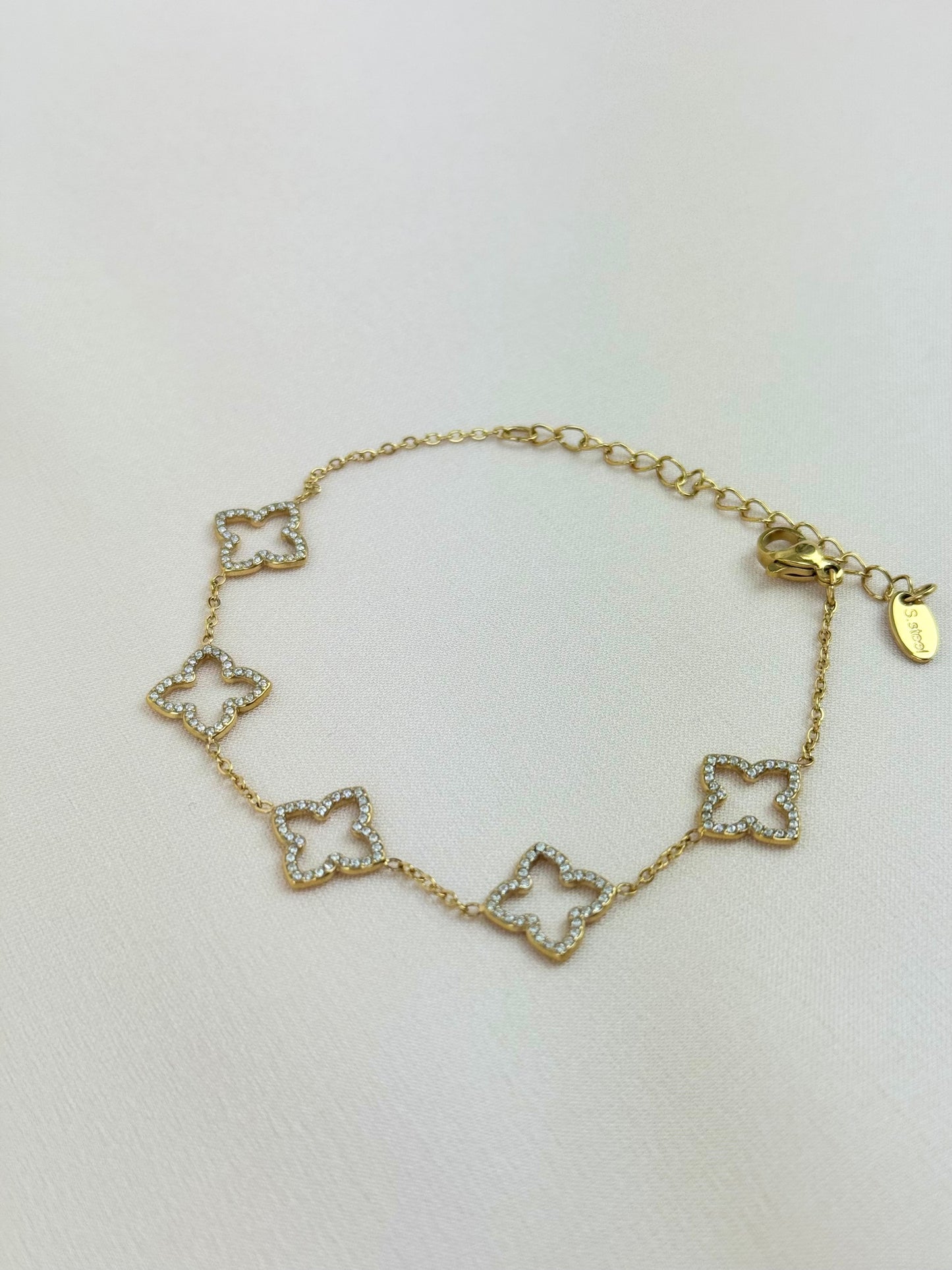 Pulseira flores quatro pétalas brilhantes