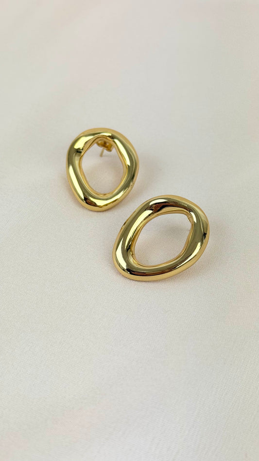 Brinco roda assimétrica aço dourado