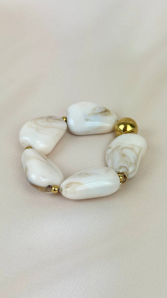 Pulseira elástica peças em acrílico creme