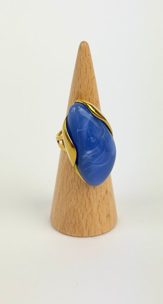 Anel dourado pedra azul