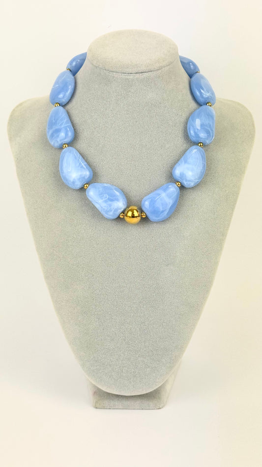 Colar peças em acrílico azul-celeste
