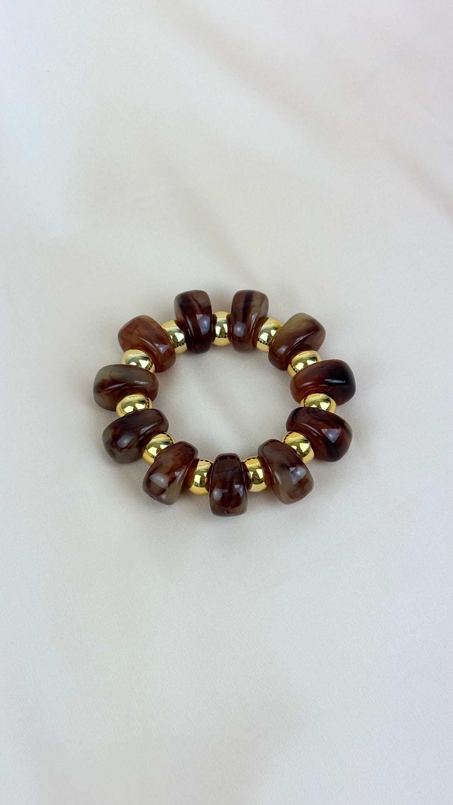 Pulseira elástica bolas douradas e Âmbar