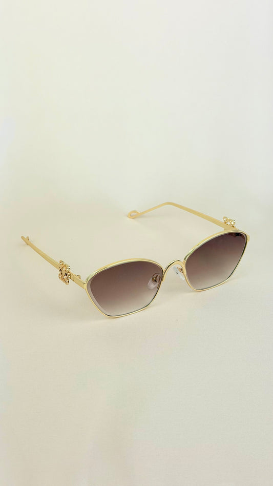 Óculos de sol aro metal dourado com lente clara