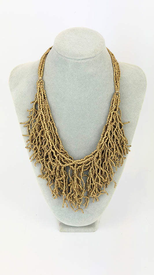 Colar missangas dourado-velho