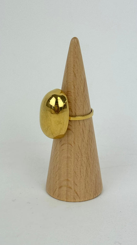 Anel aço dourado efeito oval