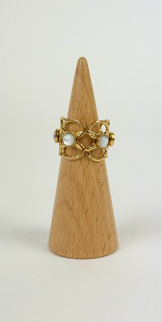 Anel aço dourado pedrinhas branco