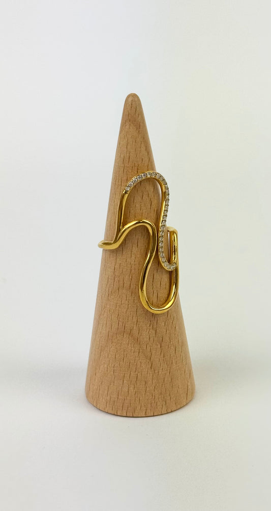 Anel aço dourado assimétrico com brilhantes