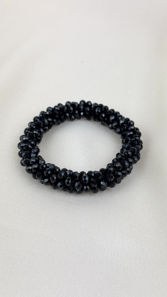 Pulseira elástica missangas pretas brilhantes