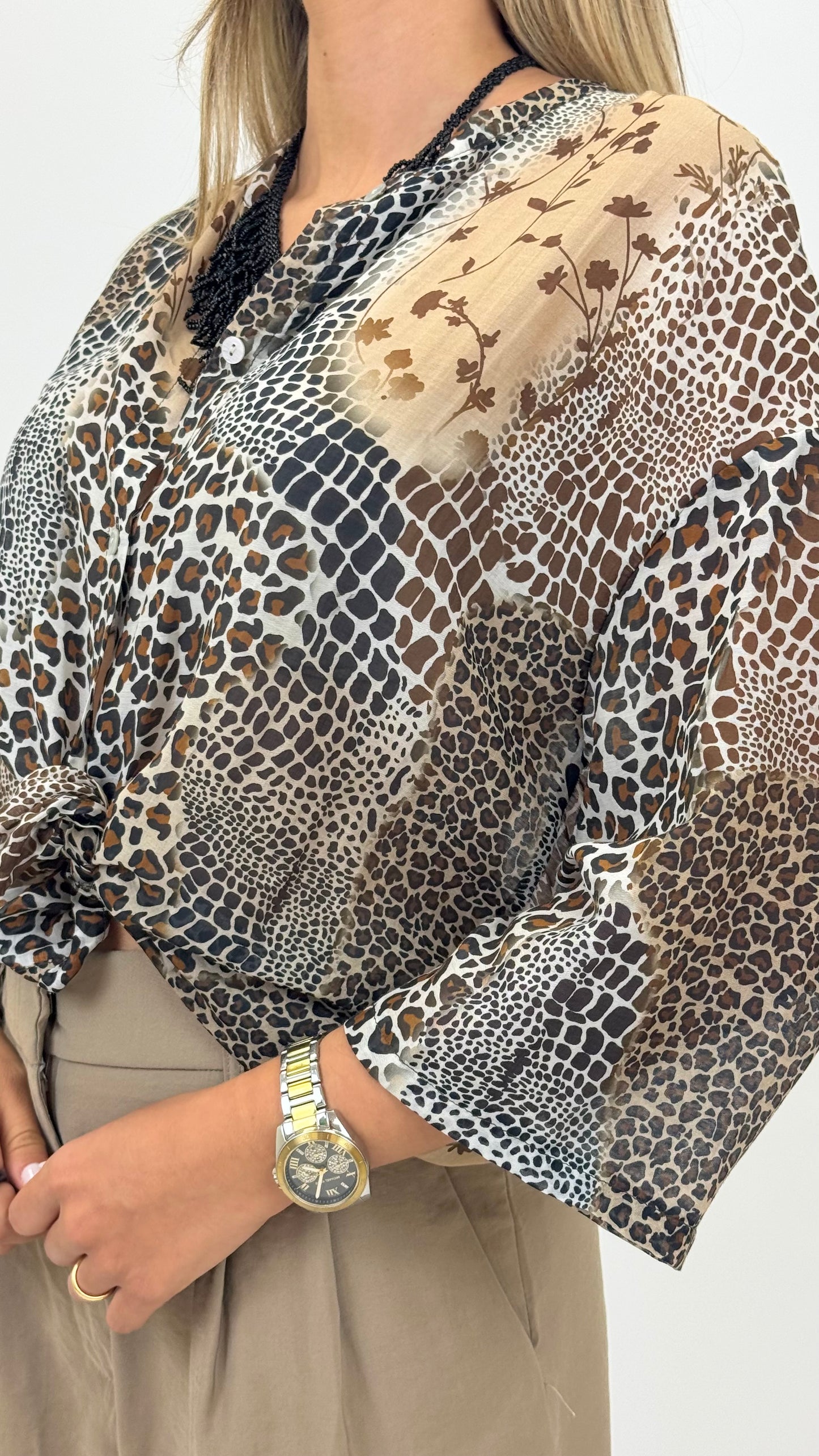 Blusa animal-print tons terra