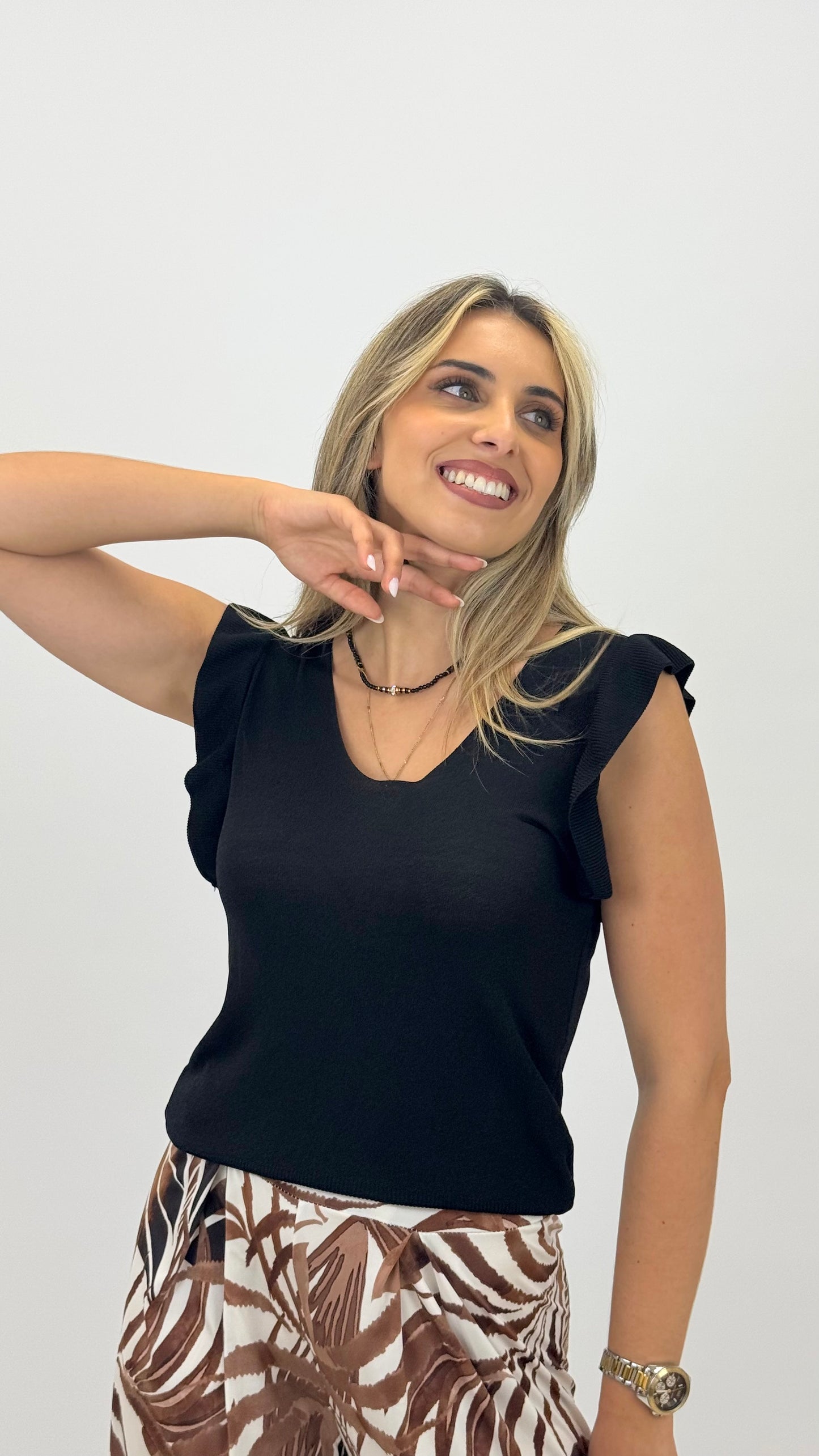 Top malha preto com manga folho