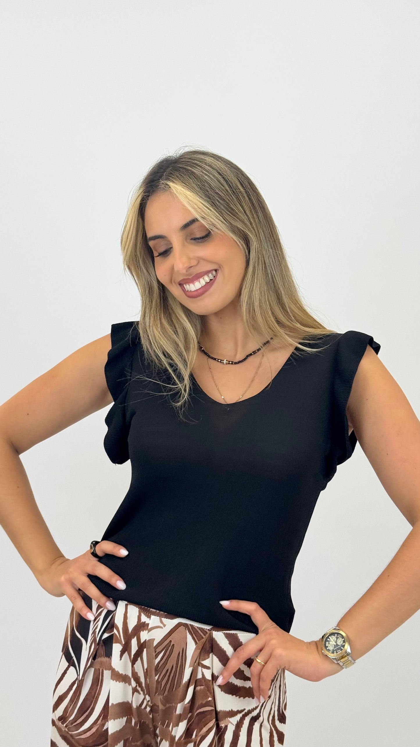 Top malha preto com manga folho