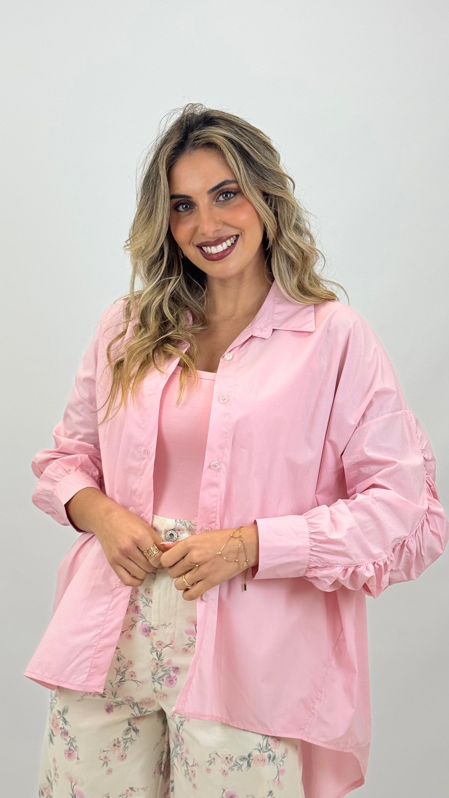 Blusa rosa oversized com drapeado na manga