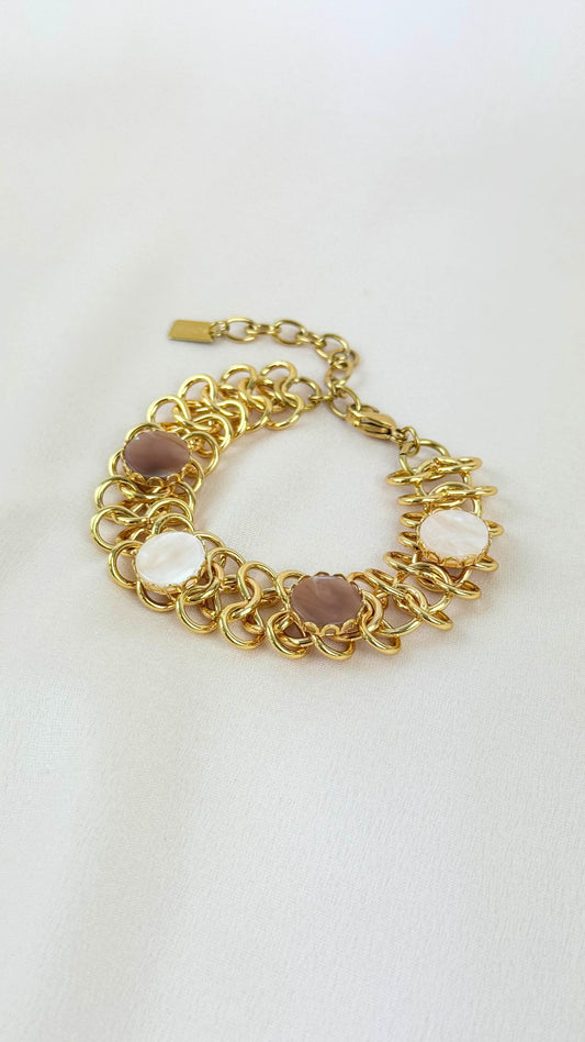 Pulseira aço dourado com pedras beges