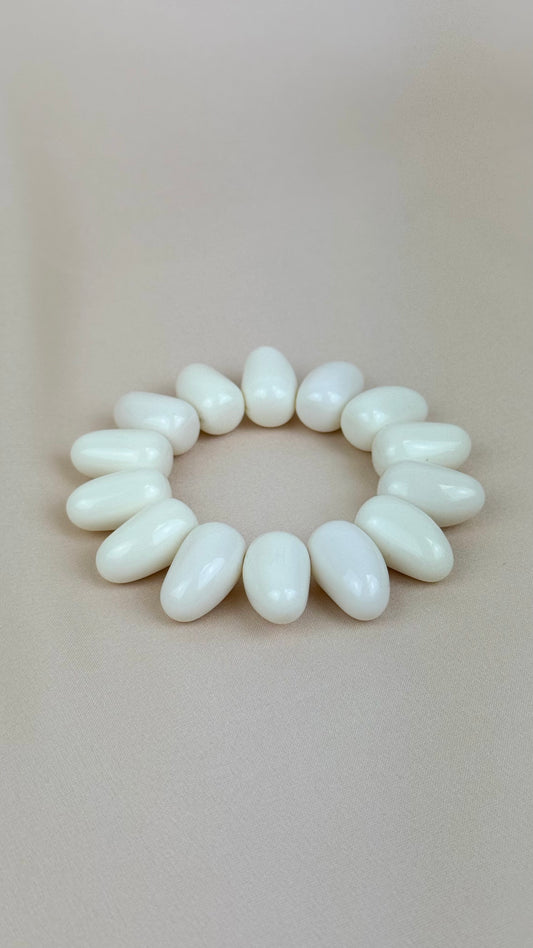 Pulseira elástico peças acrílico pérola