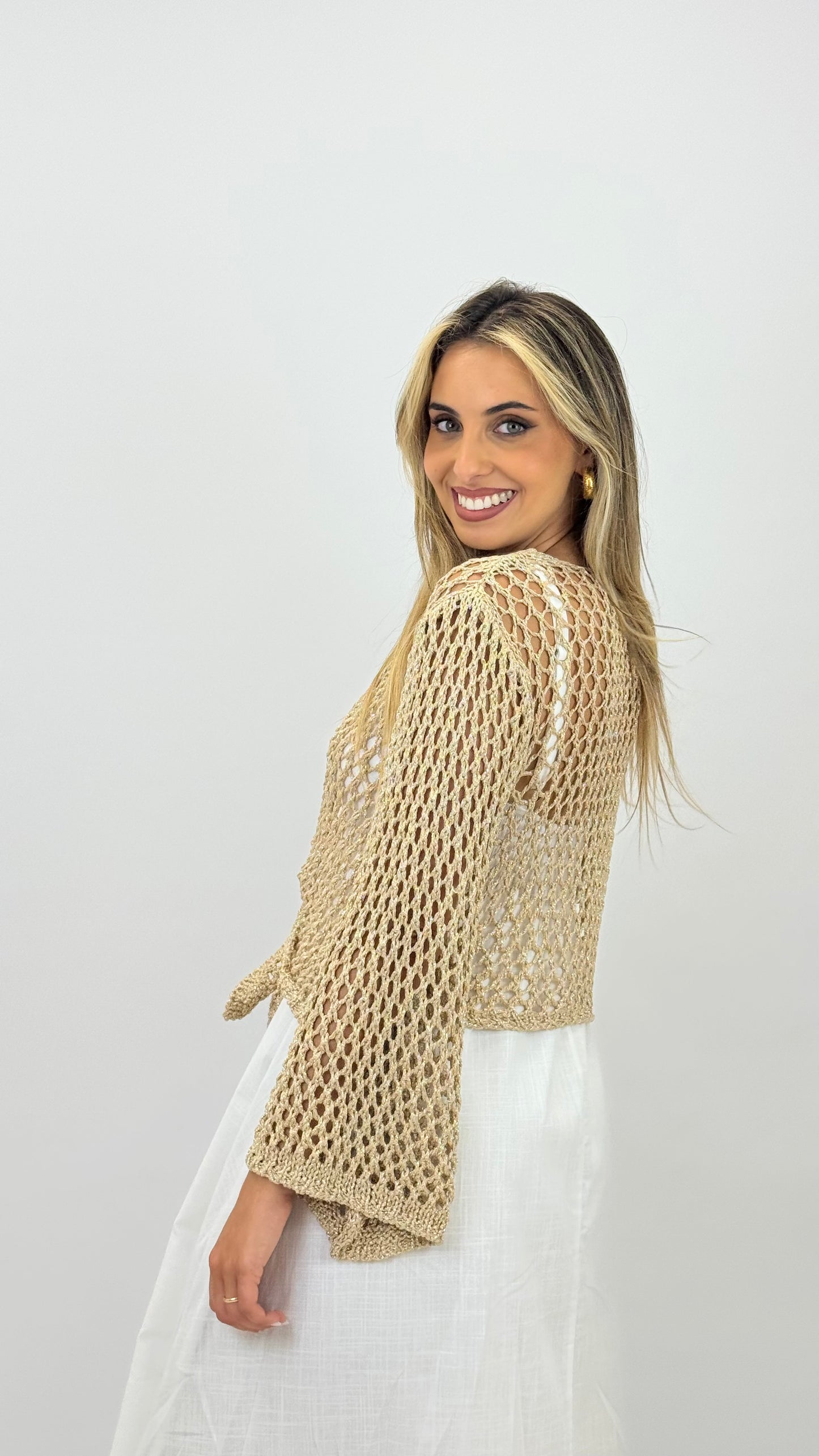 Casaco malha dourado perfurado