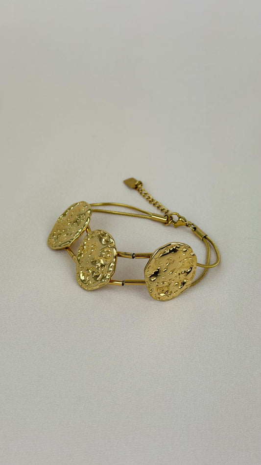 Pulseira tachas douradas