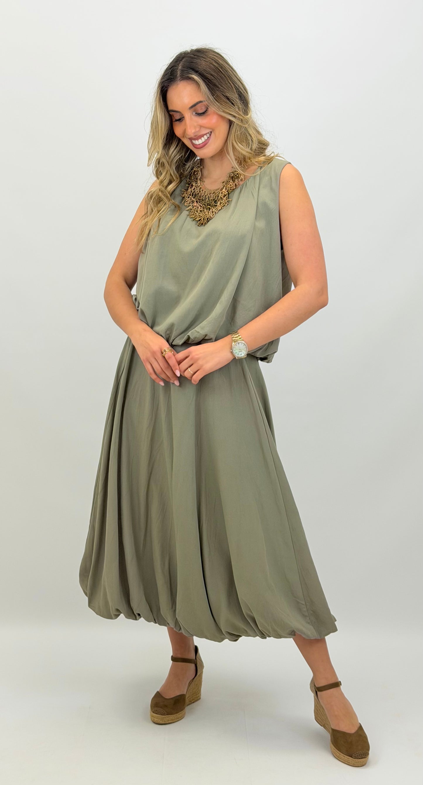 Conjunto top e saia abalonada verde