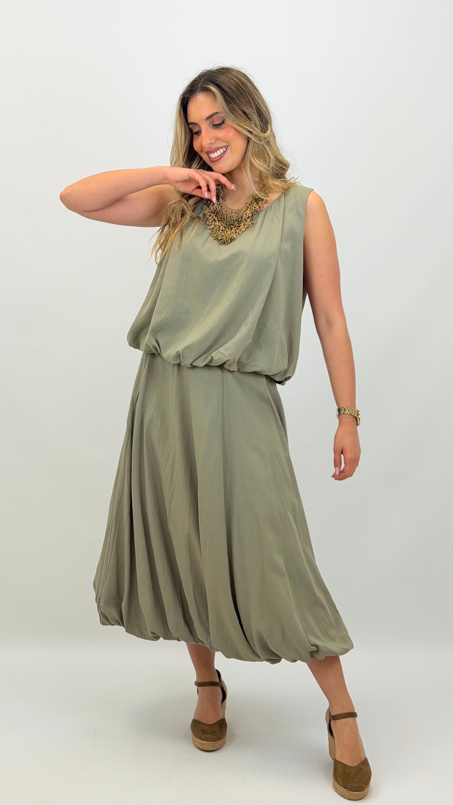 Conjunto top e saia abalonada verde