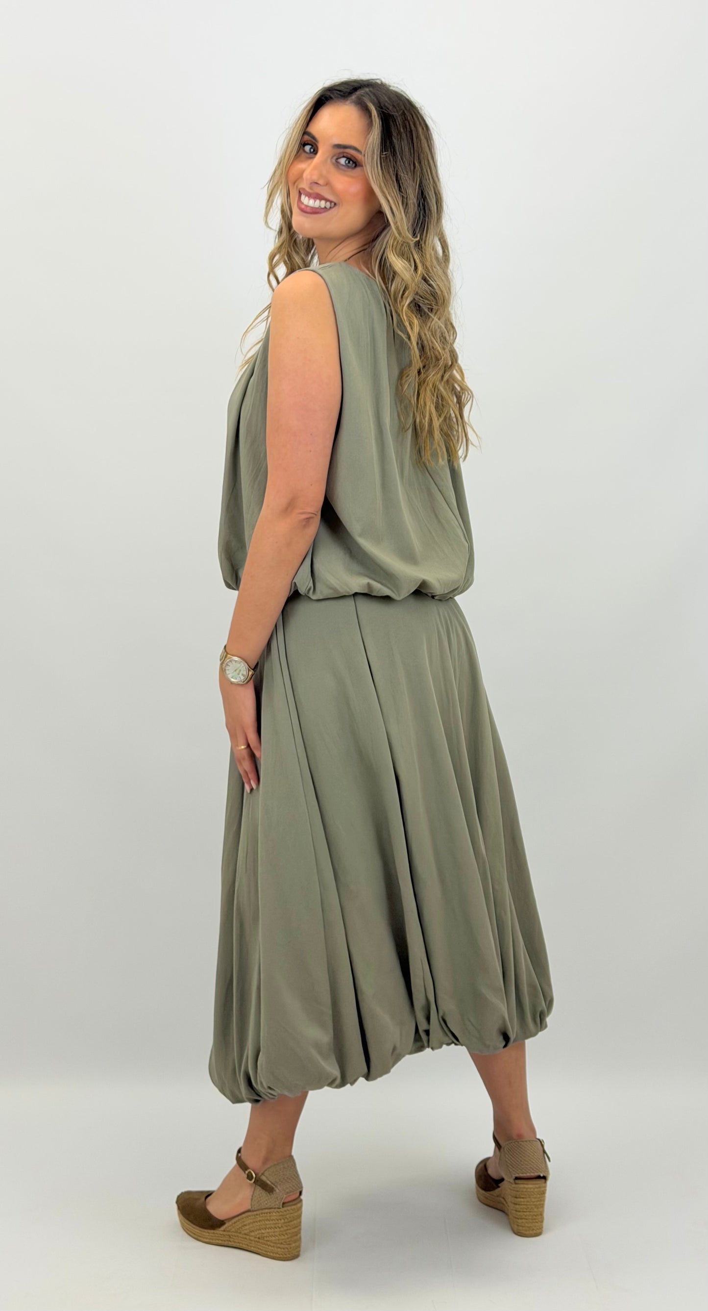 Conjunto top e saia abalonada verde