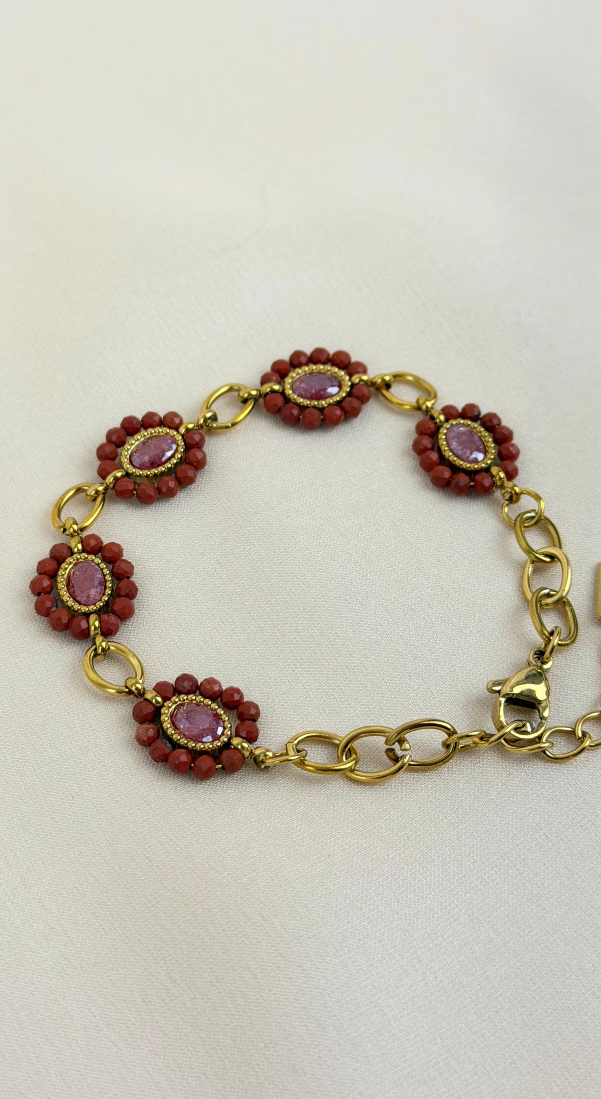 Pulseira aço dourado com missangas telha